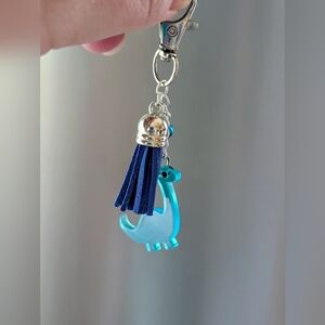 Blue Dinosaur Bag Charm With Tassel